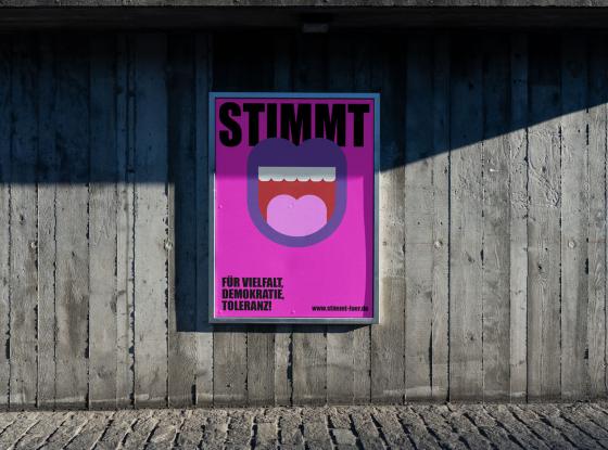 Abbildung: Kampagnenposter an einer Betonwand